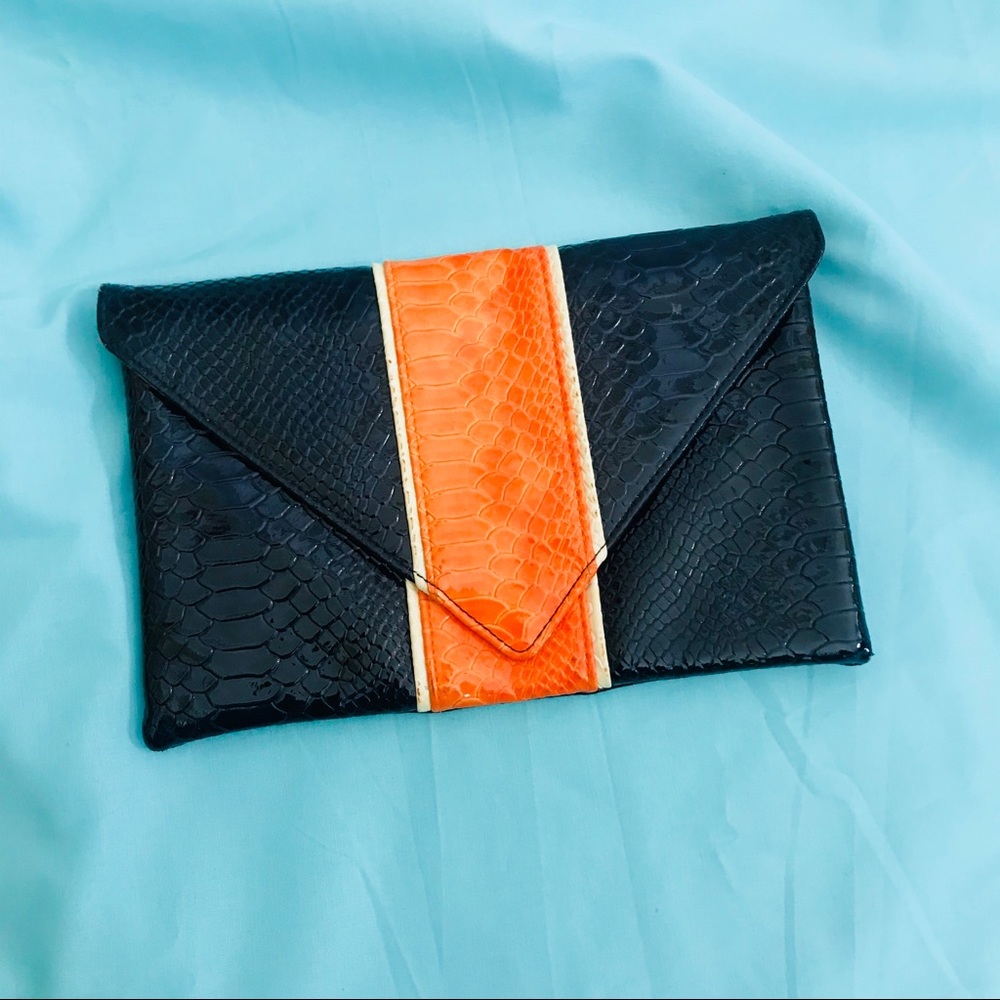 Julie brown navy orange clutch